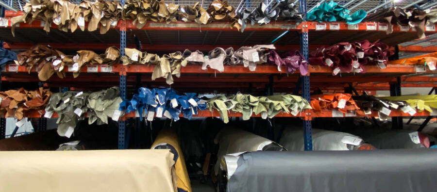 Image of brightly colored leathers ready for upholstery is a link to Cortina Leathers' limited warranty.