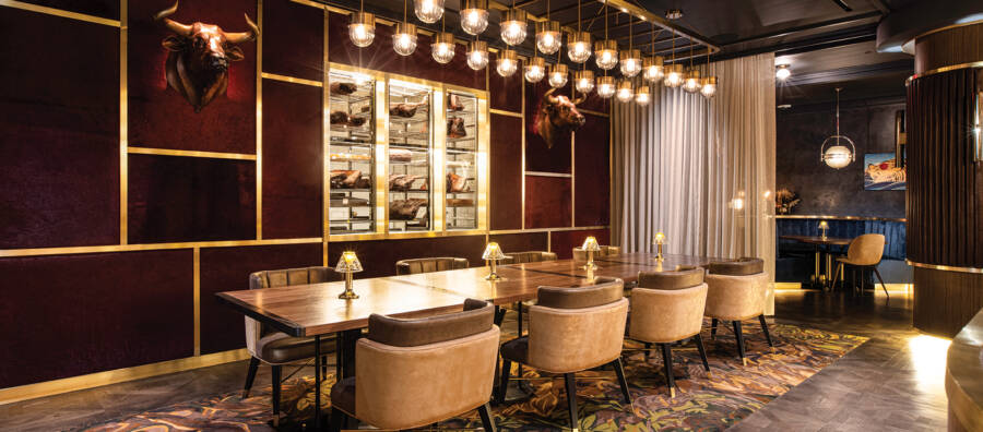 An upscale restaurant with Cortina leathers trimmed chairs