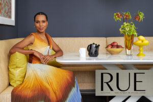 Kerry Washington magazine cover of her sitting in an elegant modern kitchen