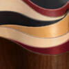A wave of Cortina Leathers Santa Fe strap leather in multiple weights and colors.