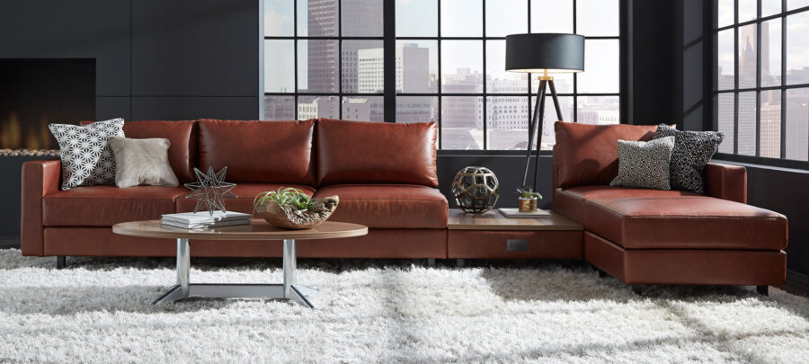 A sofa is safely covered in Cortina Florence Terra in an corporate office due to its highly cleanable Crypton protection.