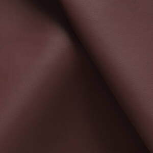 Cortina Azzurro Almandine is very dark red brown