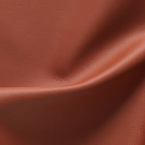 Cortina Leathers Azzurro Fireplace is a dark saturated burnt orange