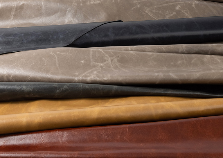 Several colors of Cortina's Como collection lay on a table