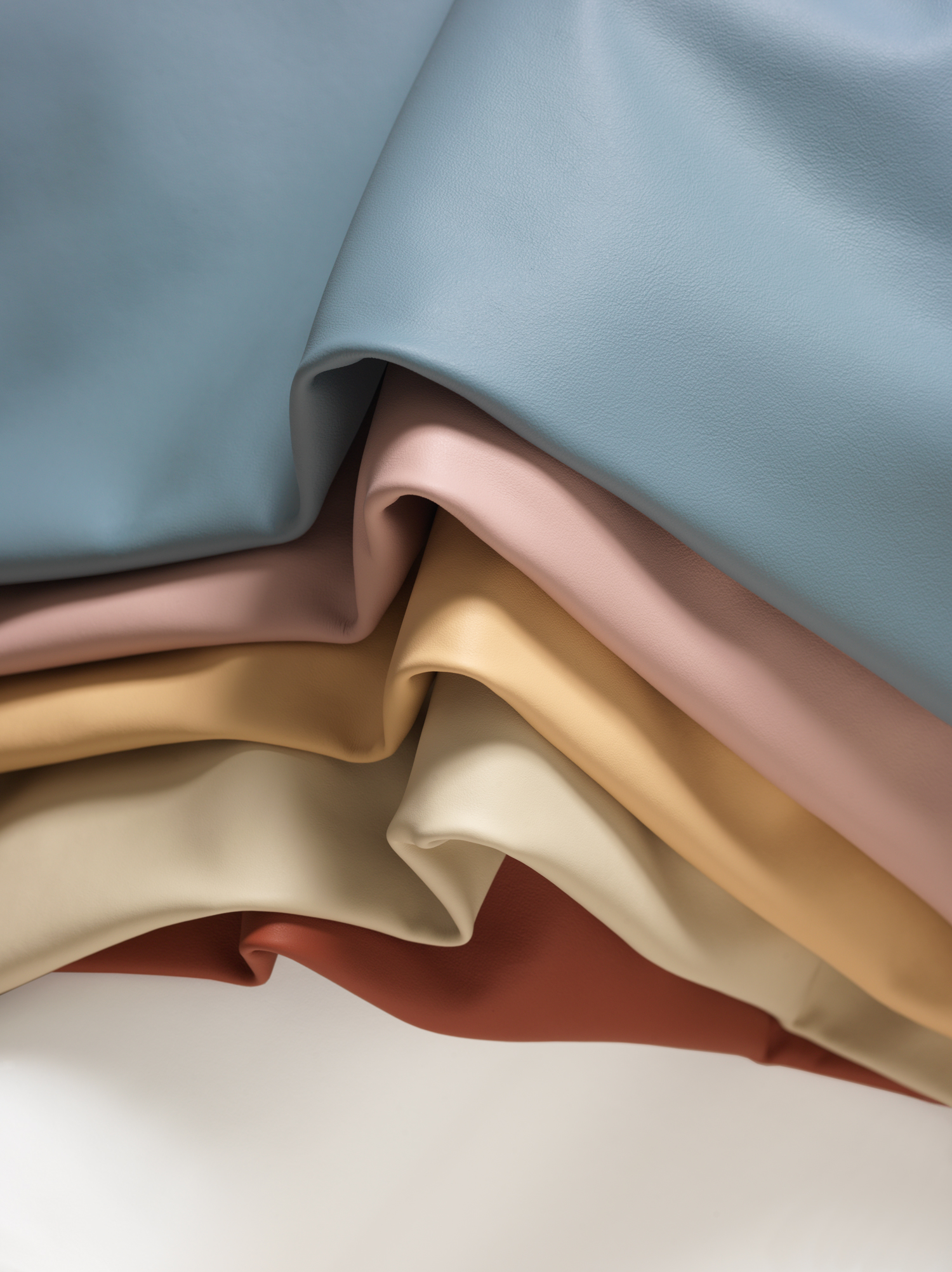 Cortina-Azzurro-Hero1-0188-adj-sm Cortina's Azzurro collection shown in 5 colors of the Cinque Terre
